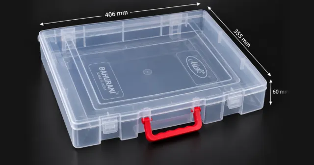 A 14 by 16 inch transparent PP Bahurani saree box with a moulded carry handle and snap latches on both sides.